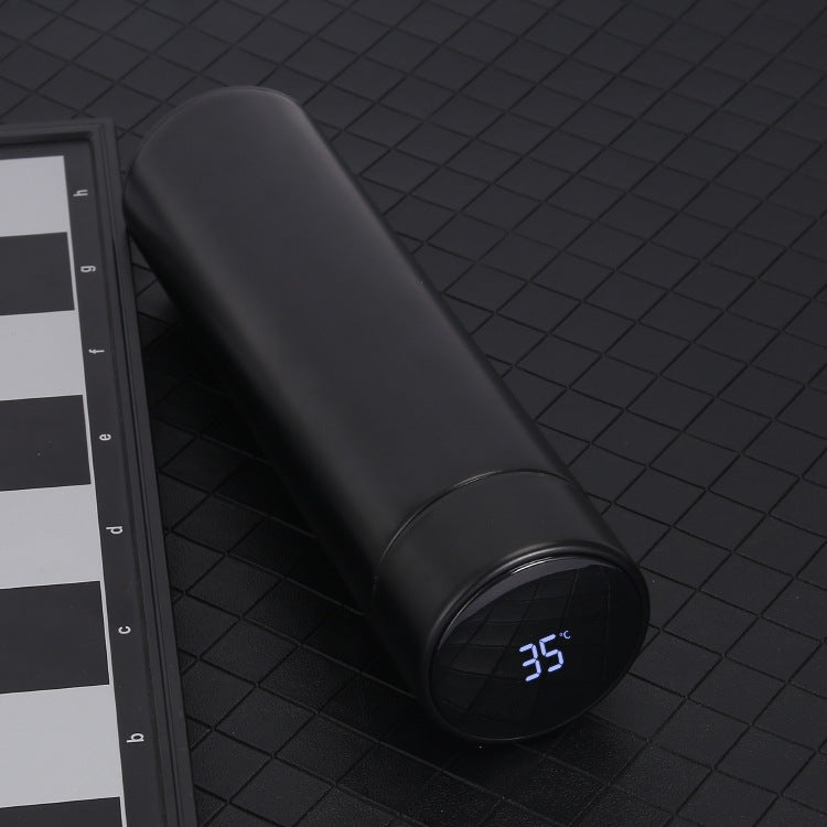 Smart stainless steel bottle that keeps drinks hot or cold for hours, with a built-in LED temperature display.